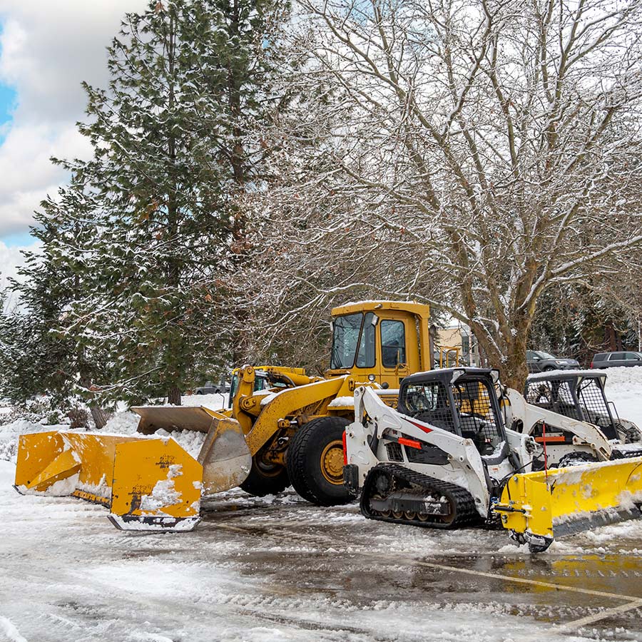 Bull Dozers Parked After Clearing Snow | Next Level Outdoor Services